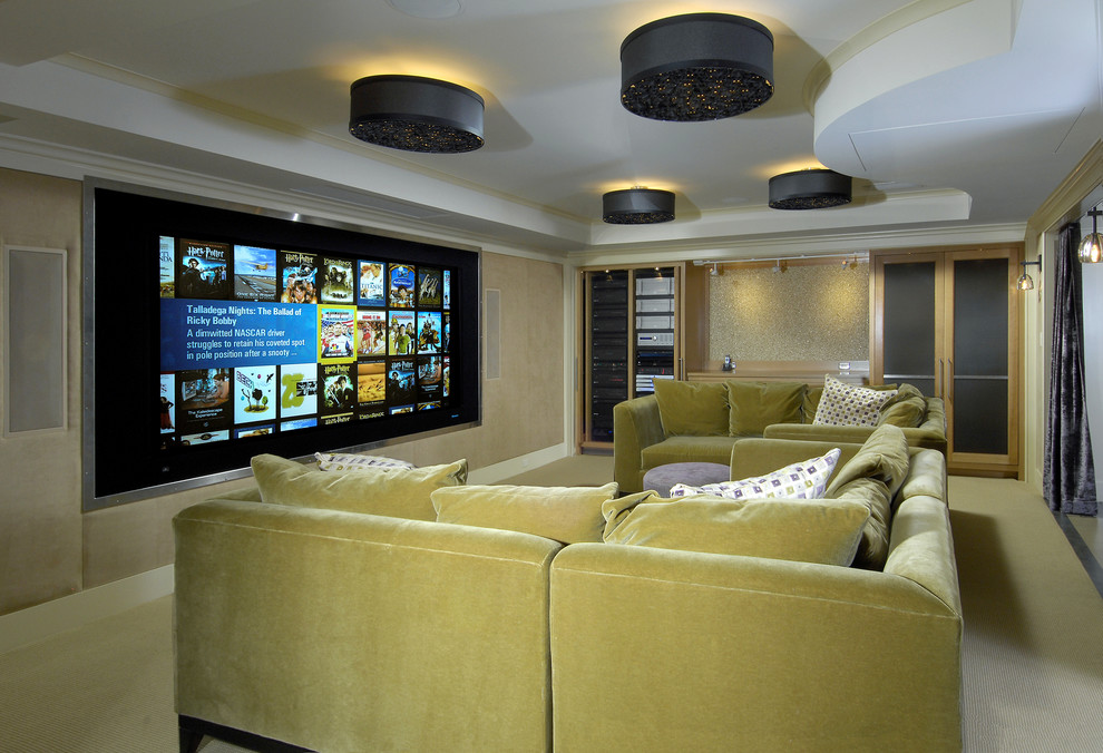 Design ideas for an eclectic home theatre in New York with a projector screen.
