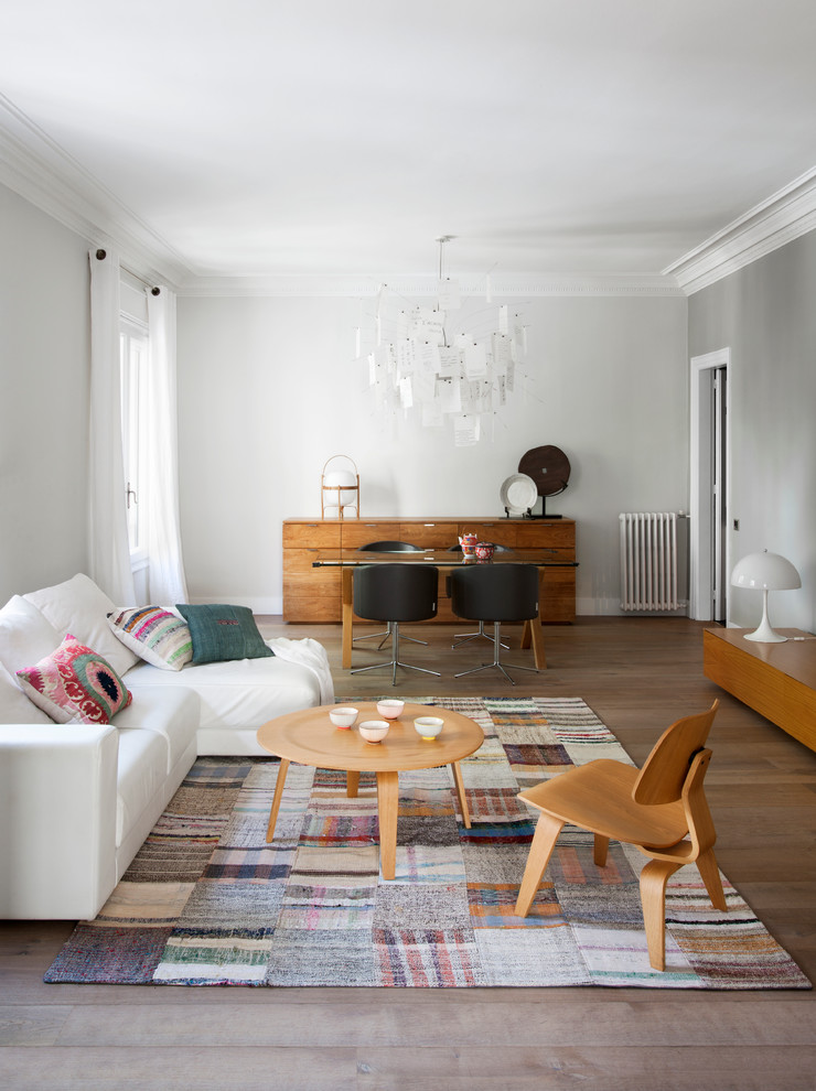 Inspiration for a mid-sized scandinavian formal open concept living room in Other with white walls, dark hardwood floors, no fireplace and no tv.