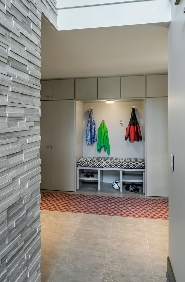 Inspiration for a contemporary mudroom in Providence with grey floor.