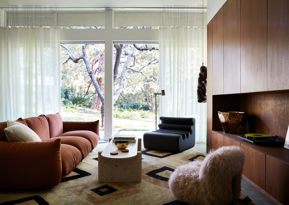 Midcentury family room in San Francisco with no fireplace.