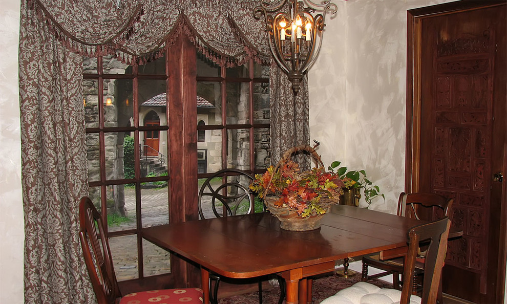 Basement - large mediterranean underground medium tone wood floor basement idea in Philadelphia with beige walls