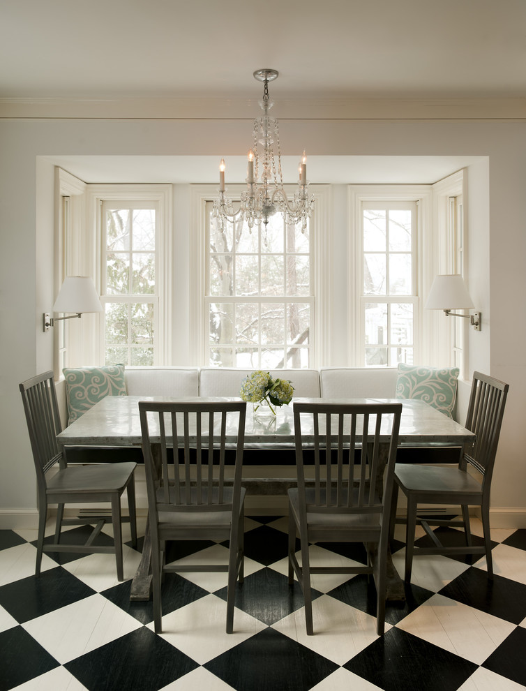 Inspiration for a traditional dining room in DC Metro with white walls, painted wood floors and multi-coloured floor.