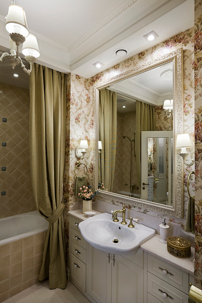 Inspiration for a traditional master bathroom in Moscow with beige tile, ceramic tile, multi-coloured walls, ceramic floors, recessed-panel cabinets, white cabinets, an alcove tub, a two-piece toilet and a drop-in sink.