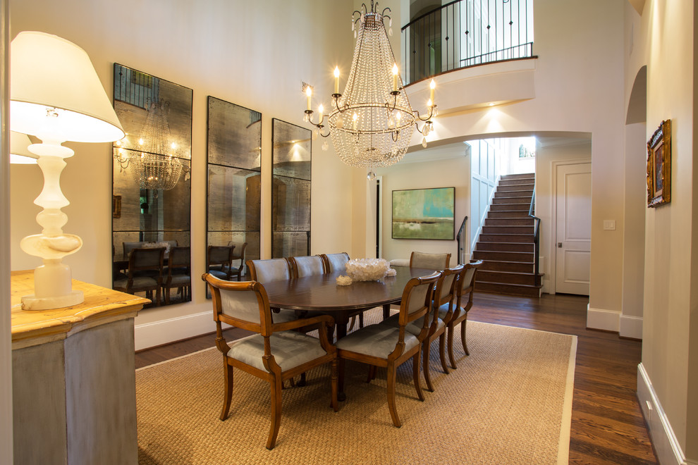 Dining room - transitional dark wood floor dining room idea in Houston with beige walls and no fireplace