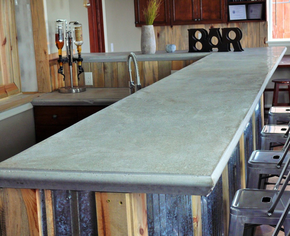 Industrial home bar in Denver with an undermount sink, concrete benchtops and concrete floors.