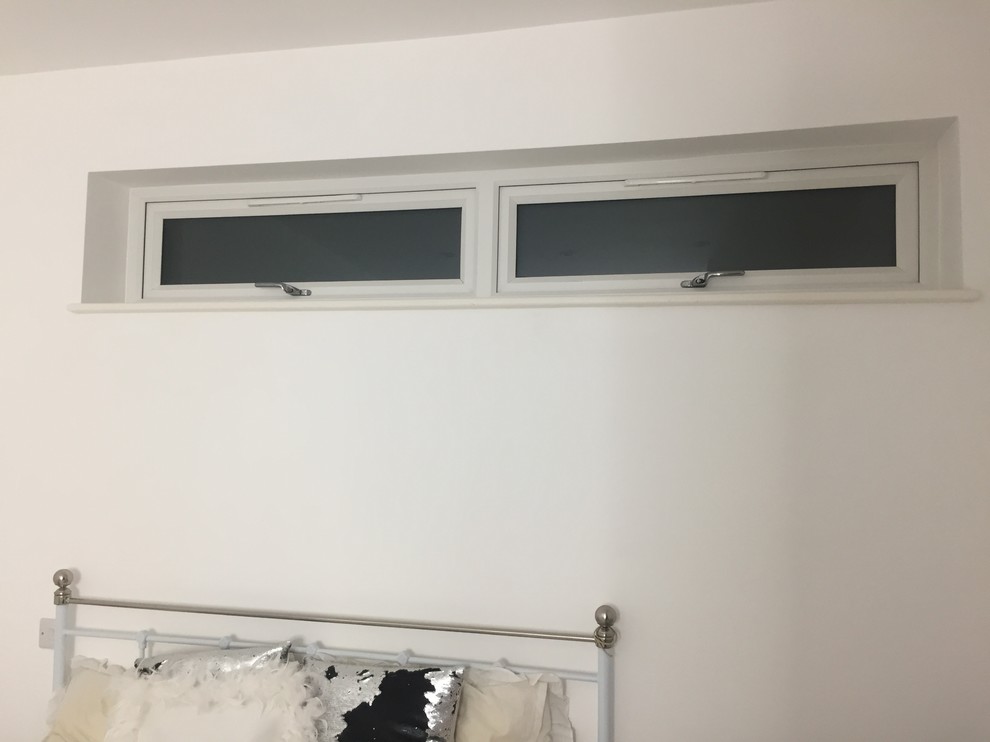 How to decorate weird windows above bed? | Houzz Forum