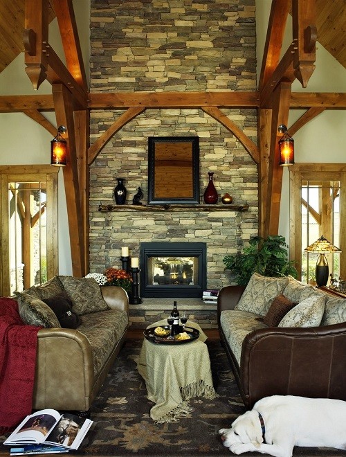 Inspiration for a large country formal living room in Denver with dark hardwood floors, a two-sided fireplace and a stone fireplace surround.