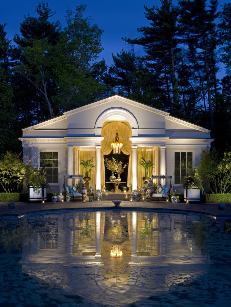 Design ideas for a traditional pool in Chicago with a pool house.