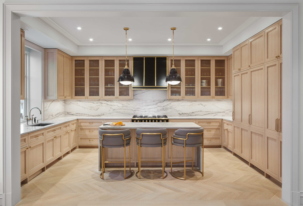 Photo of a large transitional u-shaped open plan kitchen in New York with recessed-panel cabinets, light wood cabinets, quartzite benchtops, white splashback, stone slab splashback, with island, beige floor, white benchtop and coffered.