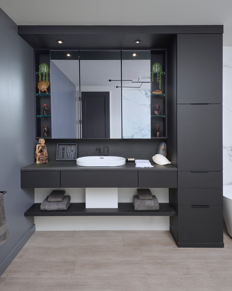 Contemporary bathroom in Toronto with flat-panel cabinets, black cabinets, grey benchtops, a single vanity and a floating vanity.