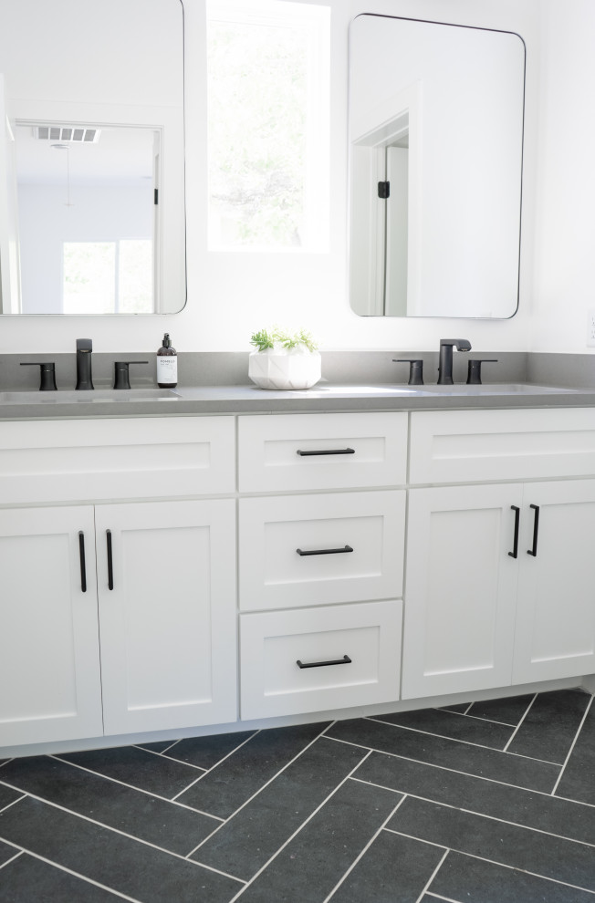Bathroom - transitional gray tile and porcelain tile porcelain tile and double-sink bathroom idea in Austin with shaker cabinets, white cabinets, white walls, quartz countertops, gray countertops and a built-in vanity