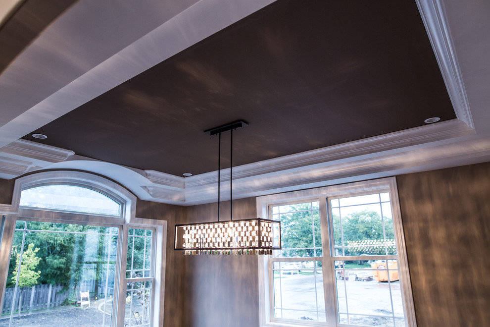 Home design - mid-sized transitional dark wood floor home design idea in Chicago with brown walls and no fireplace