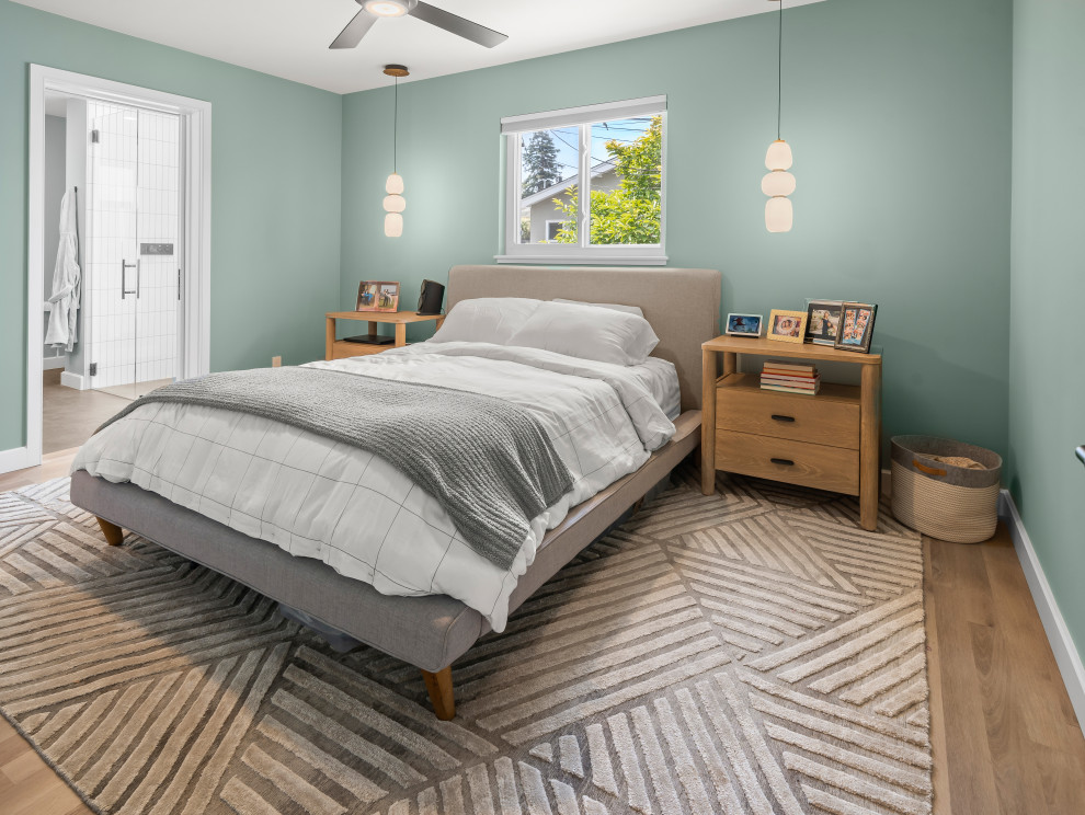 Diseño de dormitorio principal y abovedado nórdico de tamaño medio con paredes verdes, suelo vinílico y suelo beige