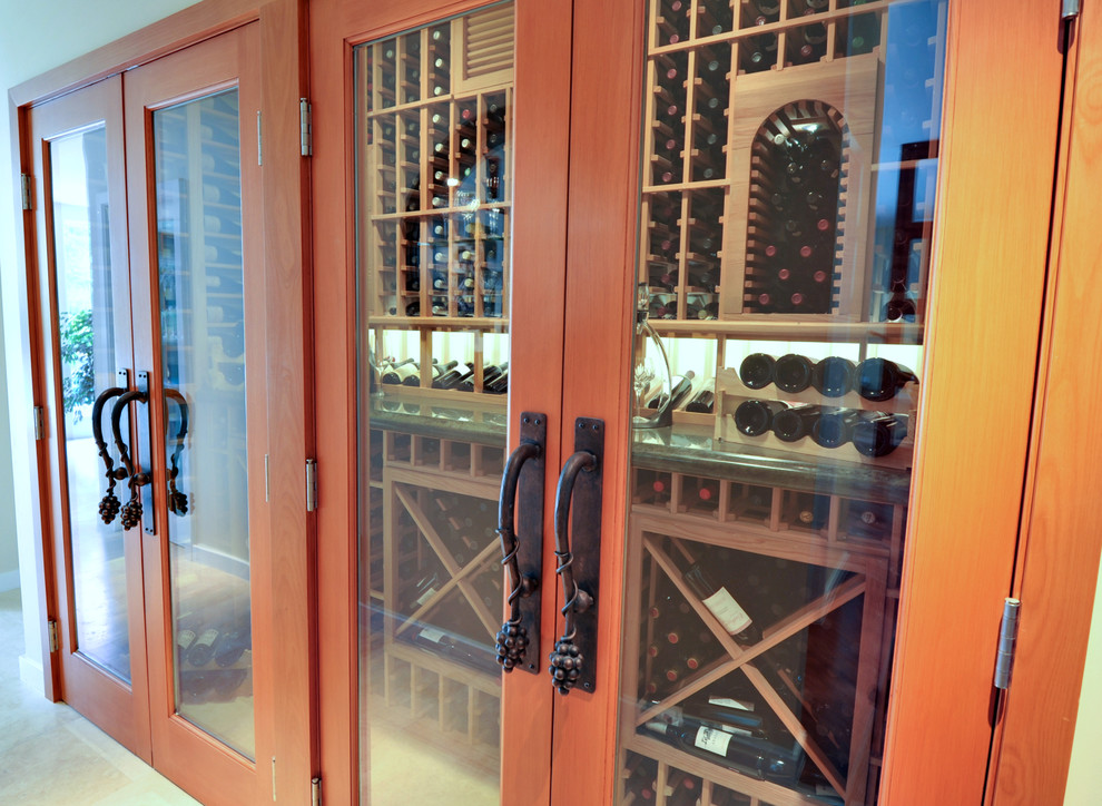 Design ideas for a large traditional wine cellar in Los Angeles with porcelain floors and storage racks.
