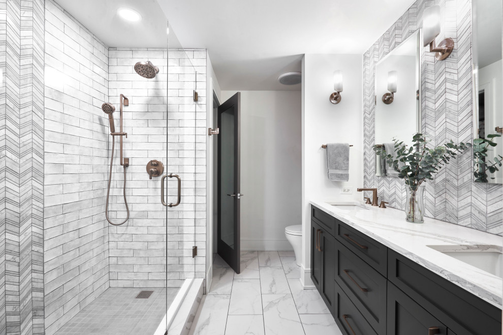 Photo of a medium sized traditional ensuite bathroom in Chicago with recessed-panel cabinets, black cabinets, an alcove shower, grey tiles, porcelain tiles, white walls, quartz worktops, white floors, a hinged door, white worktops, a shower bench, double sinks and a floating vanity unit.