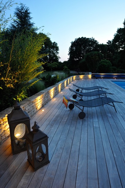 Un am&eacute;nagement de piscine &agrave; Asni&egrave;res en Poitou landhausstil-patio