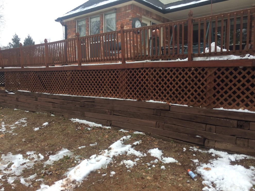 Photo of a large modern backyard deck in Oklahoma City with no cover.