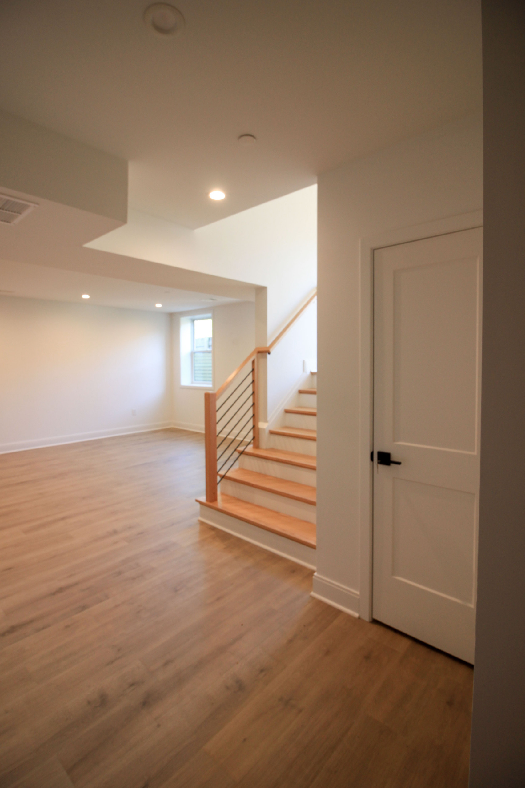 94_Neutral Color Floating Staircase with Metal Balusters, Bethesda MD 20817