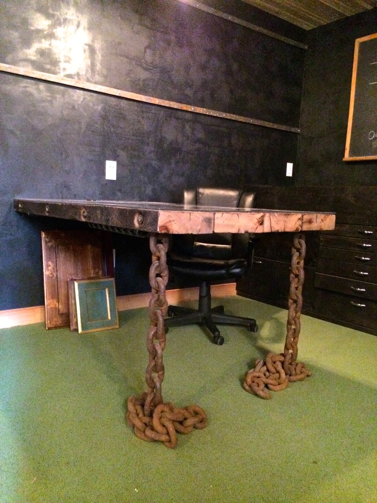 Inspiration for a mid-sized industrial home office in Philadelphia with a built-in desk.