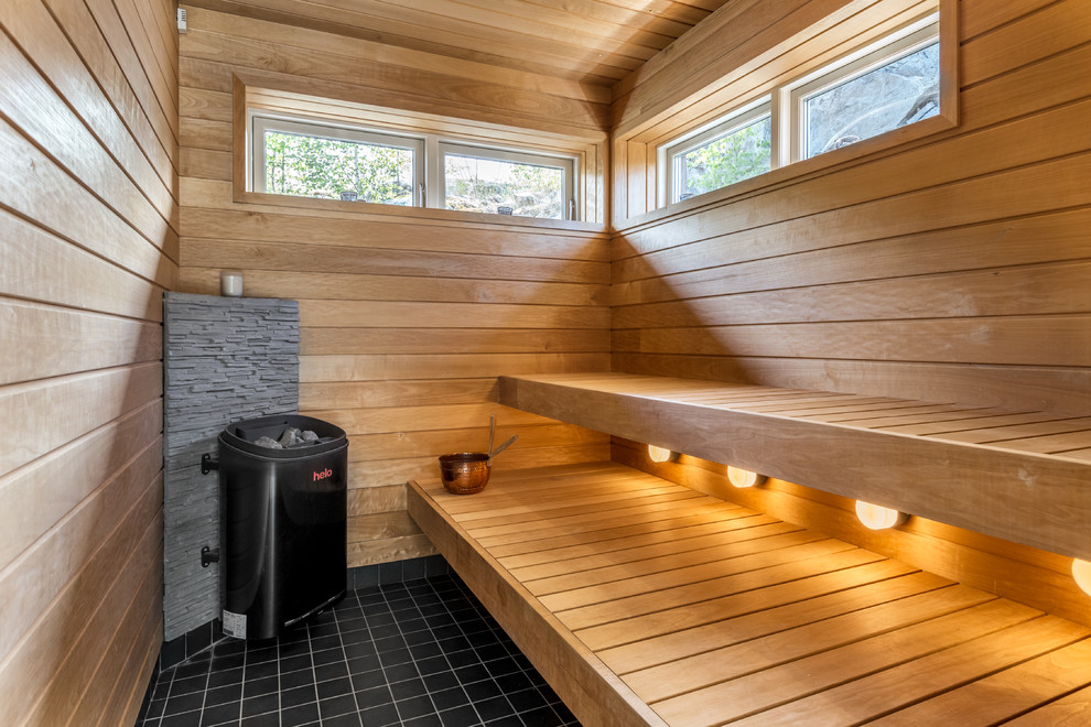 Photo of a mid-sized bathroom in Stockholm with with a sauna.