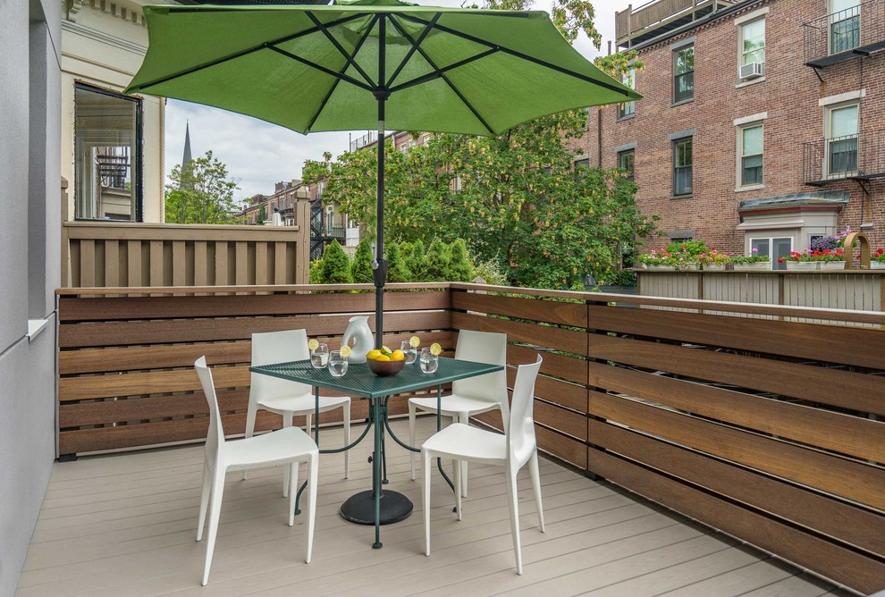 Deck - mid-sized modern backyard deck idea in Boston with no cover