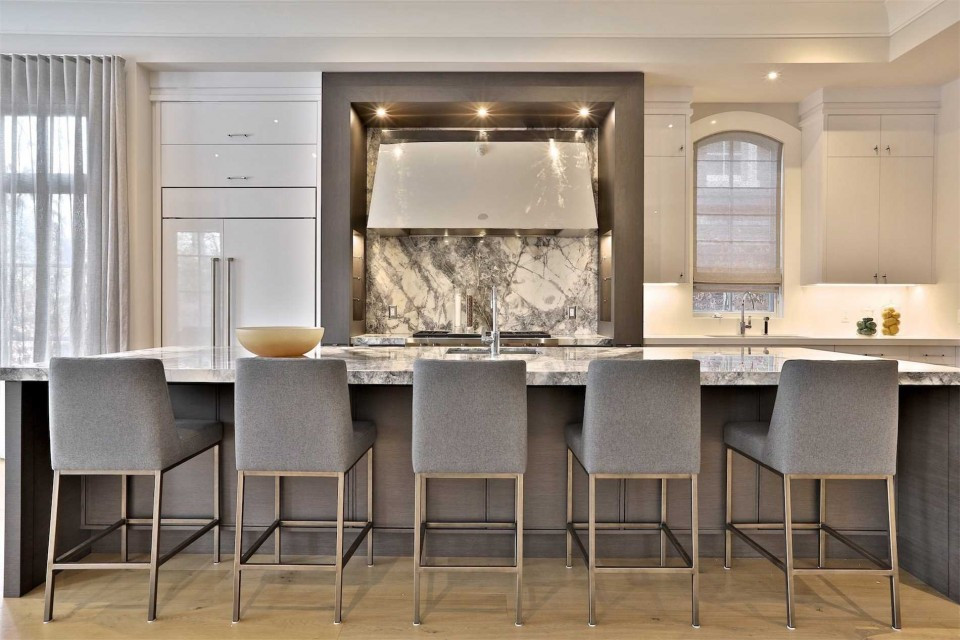 Example of a transitional kitchen design in Toronto