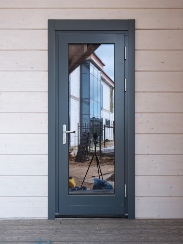 Трапецевидные окна, порталы и входные двери для современного дома