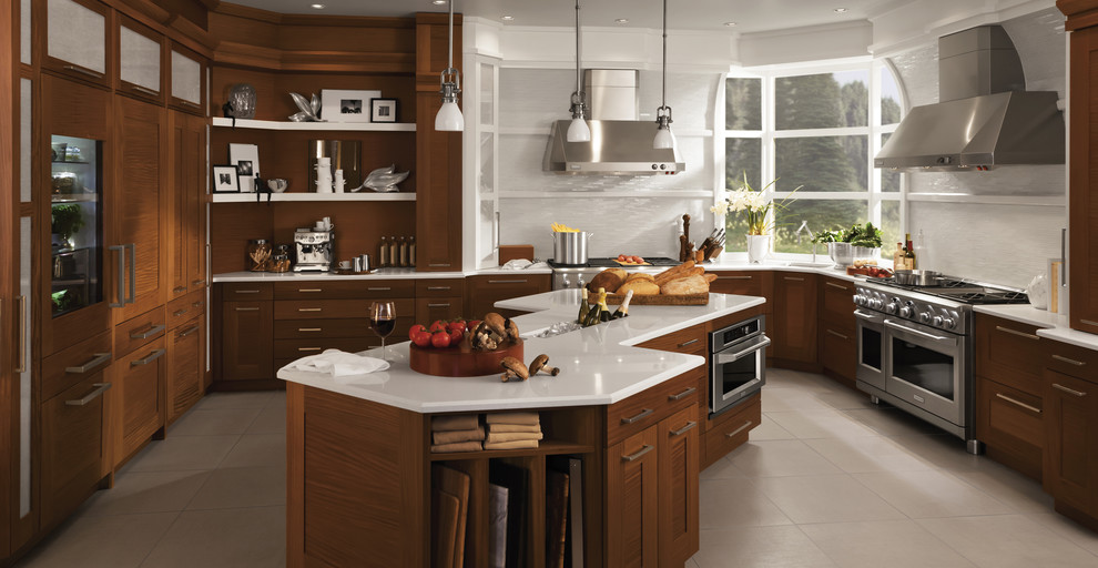 Design ideas for a large traditional u-shaped separate kitchen in Baltimore with an integrated sink, shaker cabinets, dark wood cabinets, quartz benchtops, white splashback, glass tile splashback, stainless steel appliances, porcelain floors, with island, grey floor and white benchtop.