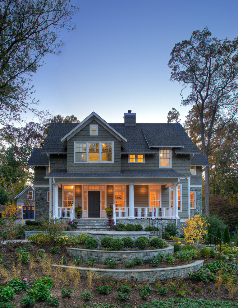Inspiration for a mid-sized traditional grey exterior in DC Metro with a gable roof, a shingle roof and a black roof.