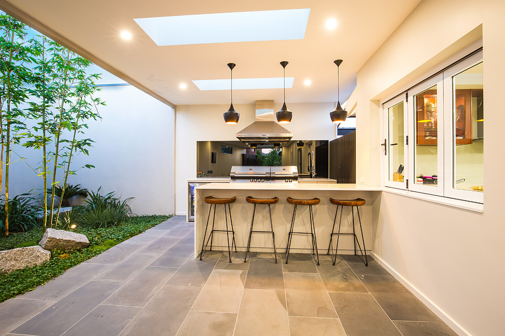 Design ideas for a tropical kitchen in Melbourne.