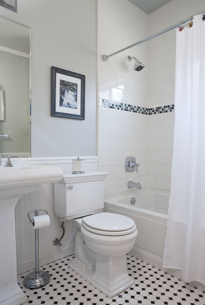 Photo of a mid-sized traditional bathroom in San Francisco with mosaic tile, a pedestal sink, an alcove tub, a shower/bathtub combo, a two-piece toilet, ceramic floors, grey walls and a shower curtain.