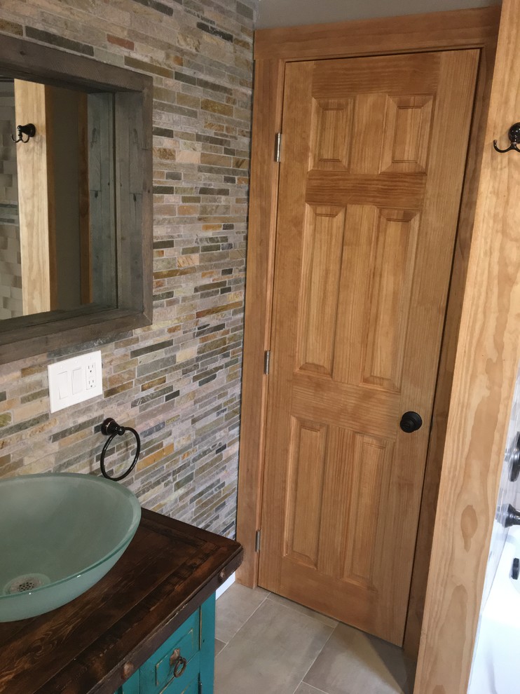 Example of a mountain style home design design in Denver