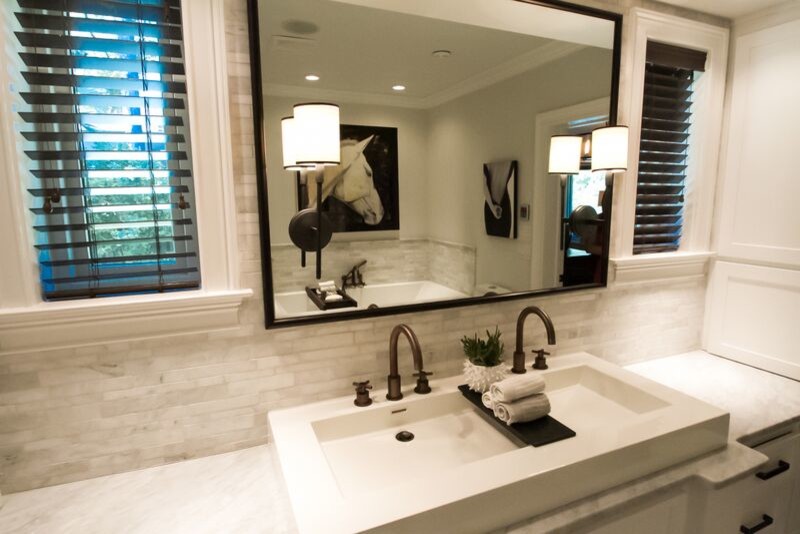 Small transitional master bathroom in Other with a trough sink, shaker cabinets, white cabinets, a drop-in tub, a double shower, a one-piece toilet, white tile, white walls, marble floors, marble benchtops and mosaic tile.