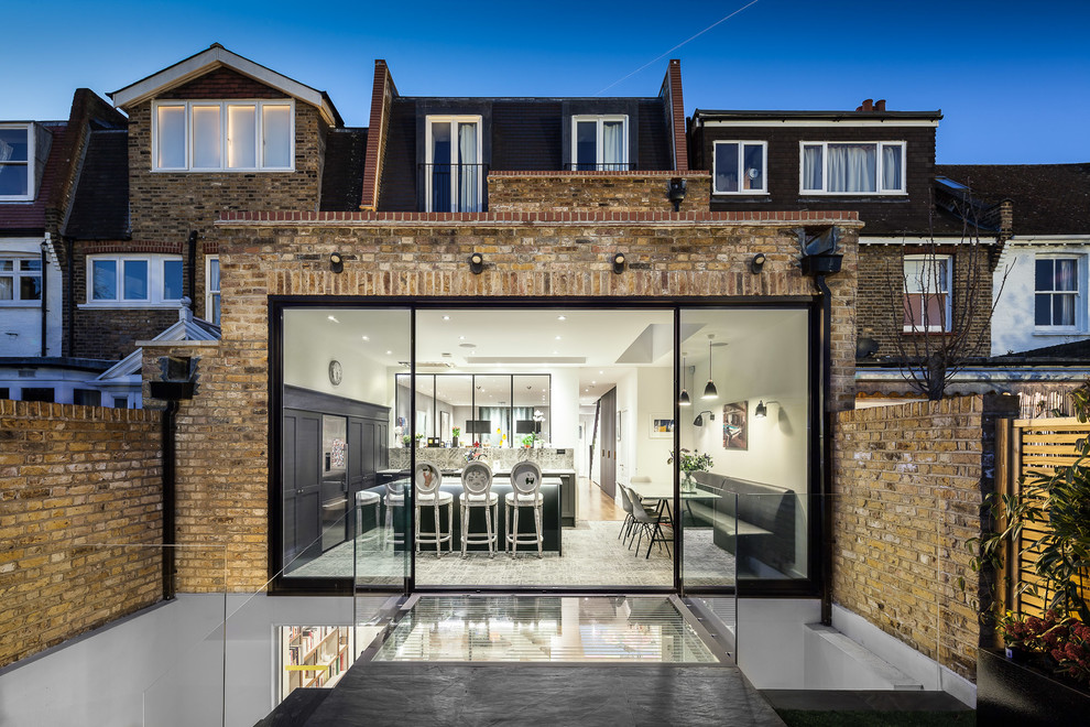 Design ideas for a contemporary one-storey brick exterior in London.
