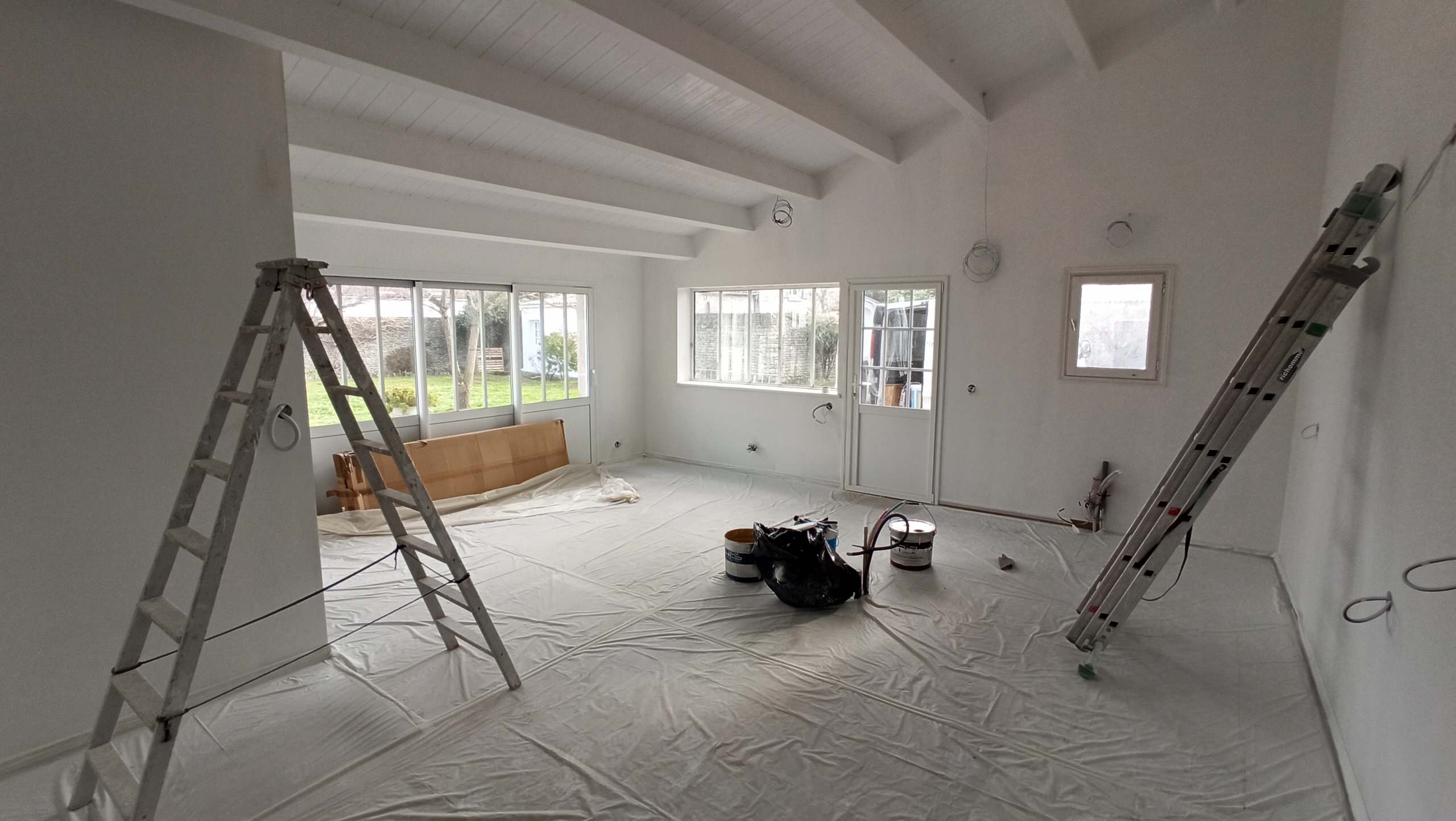 Transformation d'une chambre parentale en pièce de vie/cuisine