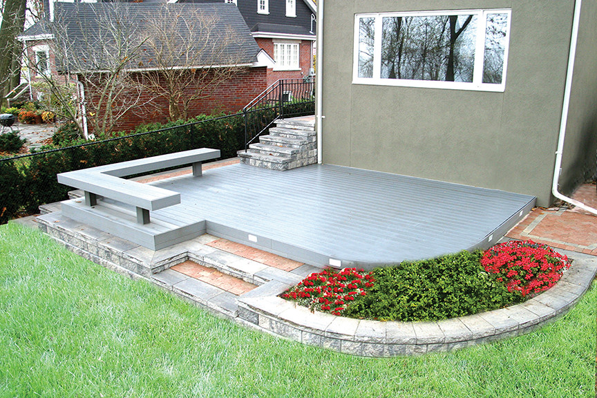Example of a small minimalist backyard home design design in Toronto