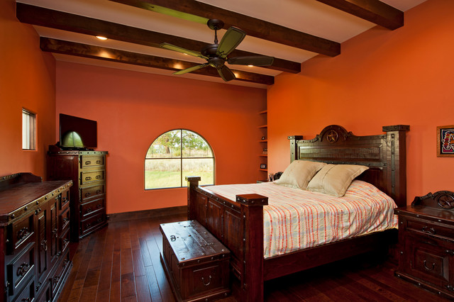 Master Bedroom Orange Colored Walls Exposed Beams Hardwood