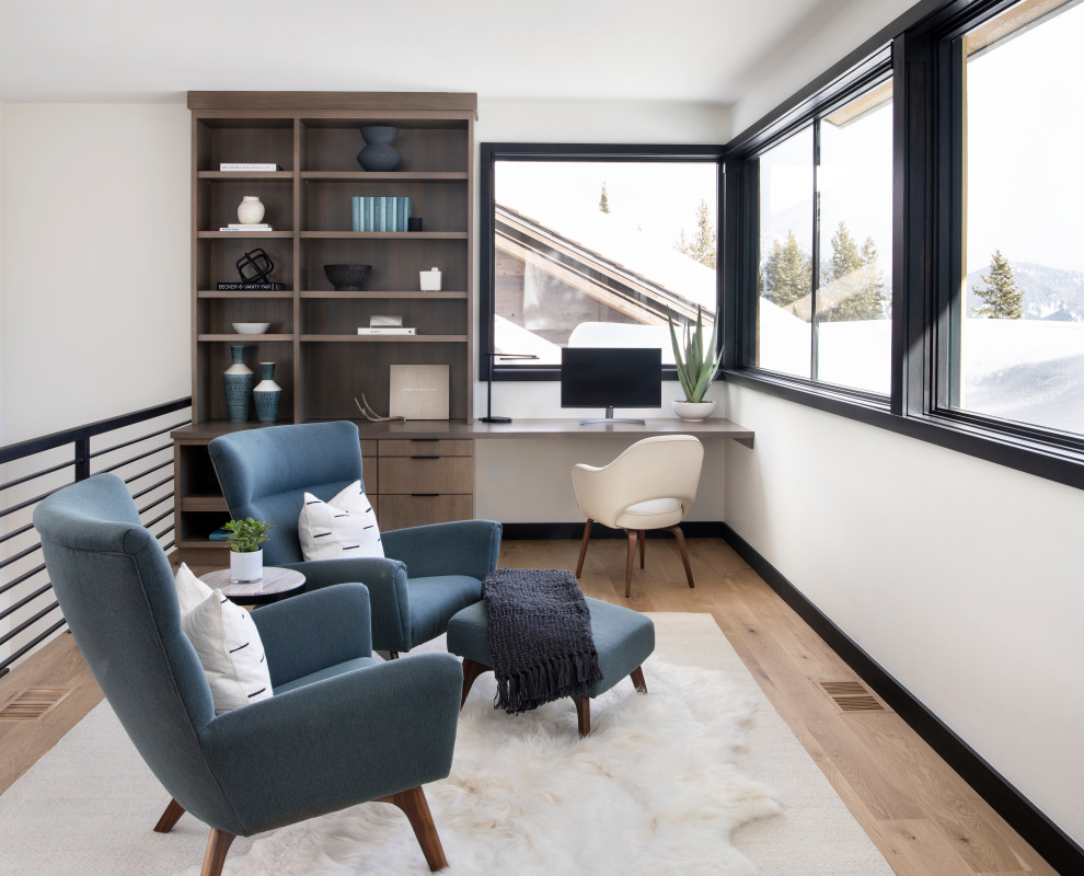 Example of a trendy home office design in Other