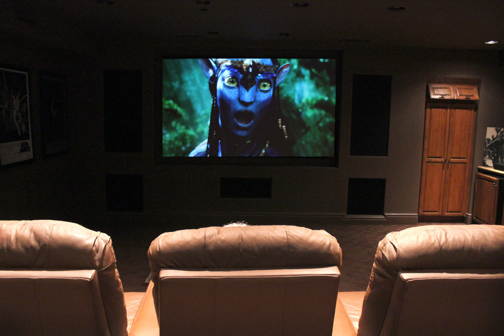 Home theater - mid-sized contemporary enclosed carpeted home theater idea in San Diego with brown walls and a projector screen