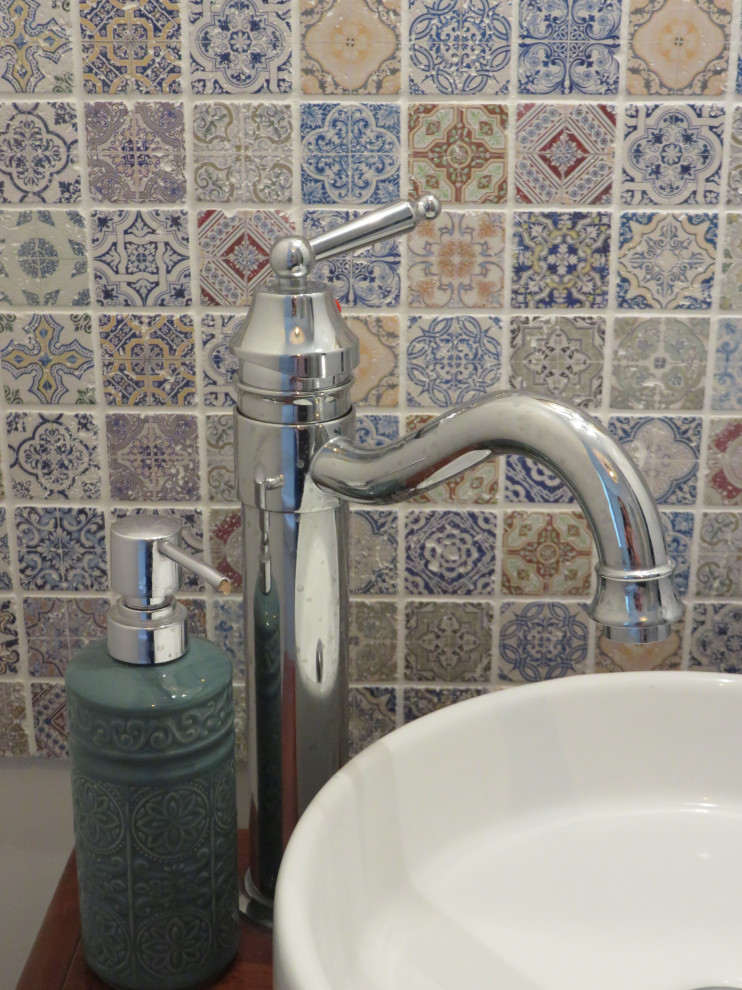 Small traditional kids bathroom in Paris with a drop-in tub, multi-coloured tile, mosaic tile, white walls, wood-look tile, a drop-in sink, wood benchtops, brown floor, brown benchtops and a single vanity.