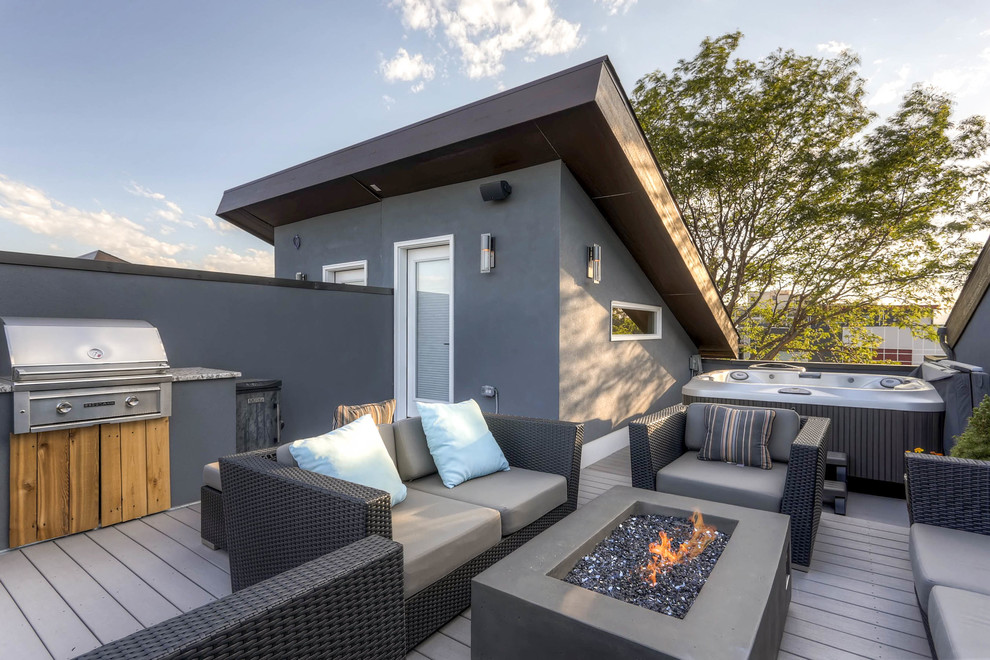 Inspiration for a mid-sized transitional rooftop deck in Denver with an outdoor kitchen and no cover.
