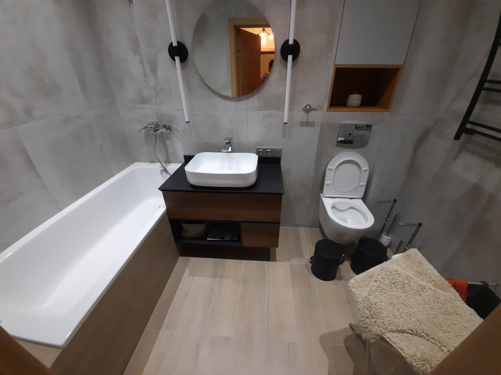 Строгий дизайн аппартаментов (3 комнаты) в темных тонах