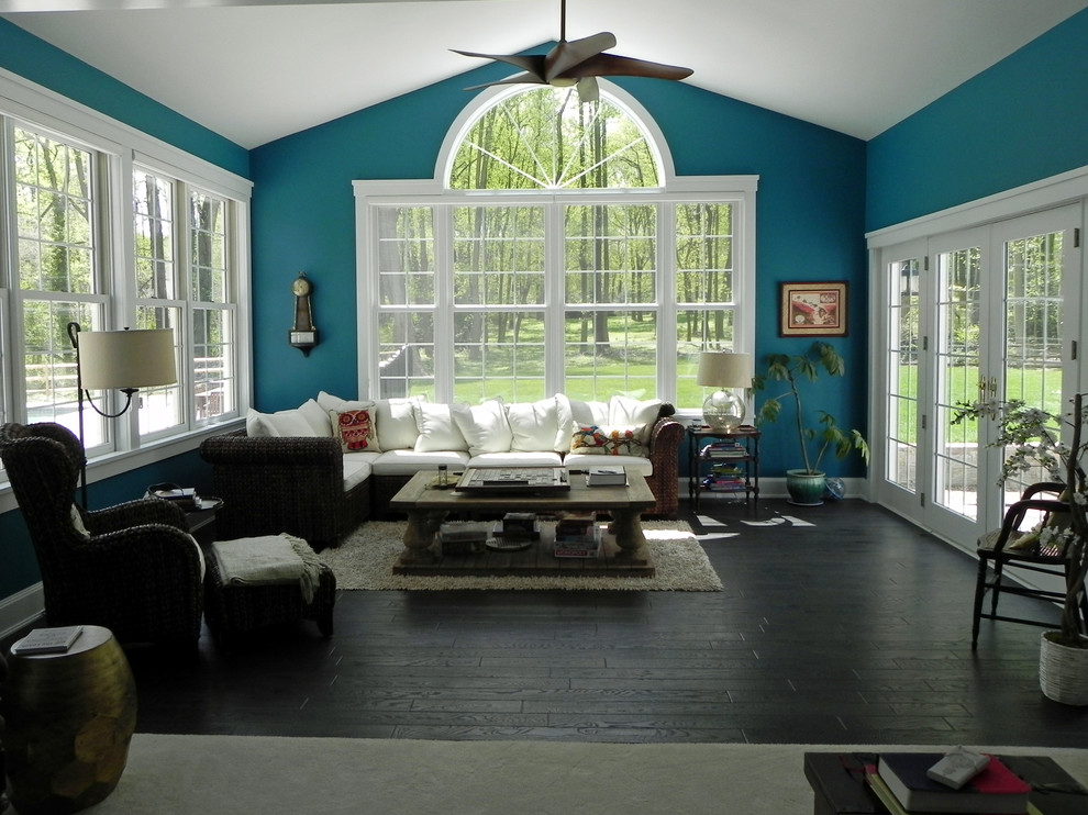 Large transitional sunroom in Baltimore with dark hardwood floors, no fireplace, a standard ceiling and brown floor.
