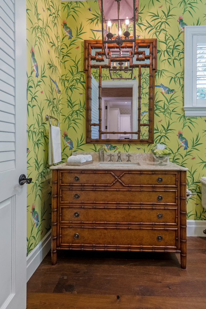 Design ideas for a large traditional 3/4 bathroom in Other with raised-panel cabinets, turquoise cabinets, a one-piece toilet, yellow walls, dark hardwood floors, an undermount sink, marble benchtops, brown floor and beige benchtops.