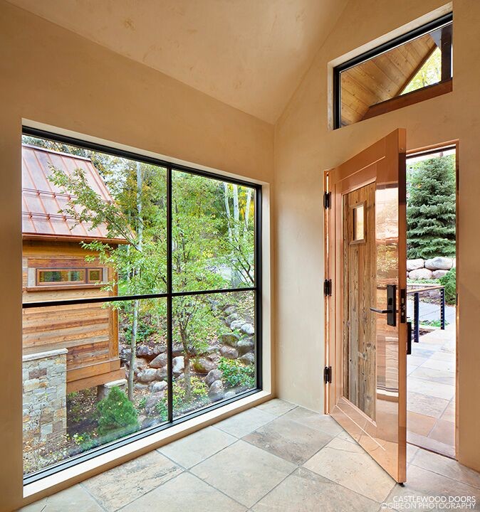 Large modern front door in Denver with beige walls, slate floors, a single front door and a metal front door.
