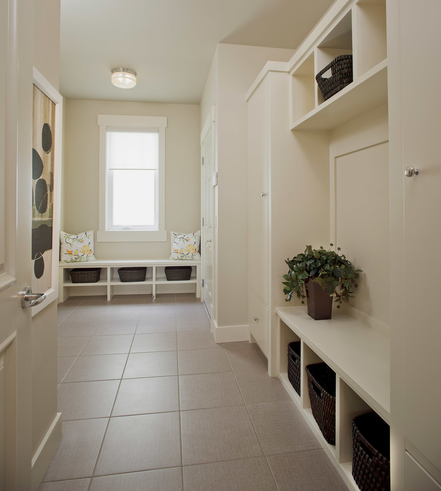 Inspiration for a traditional entryway in Calgary with beige walls.