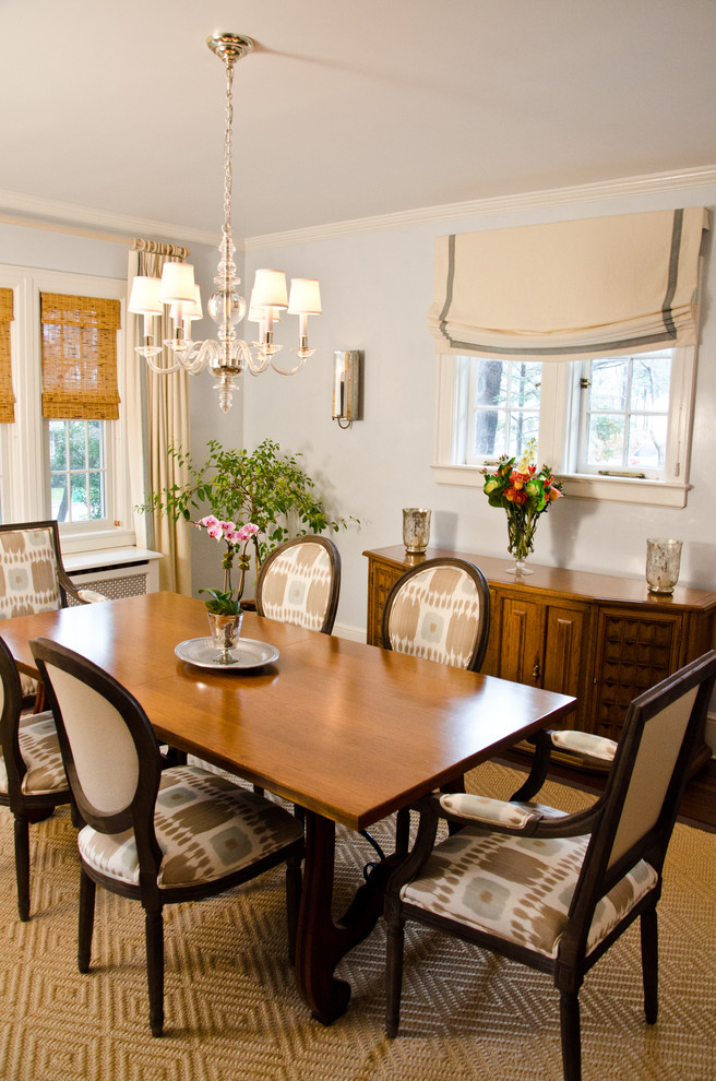 Inspiration for a traditional dining room in New York with white walls.