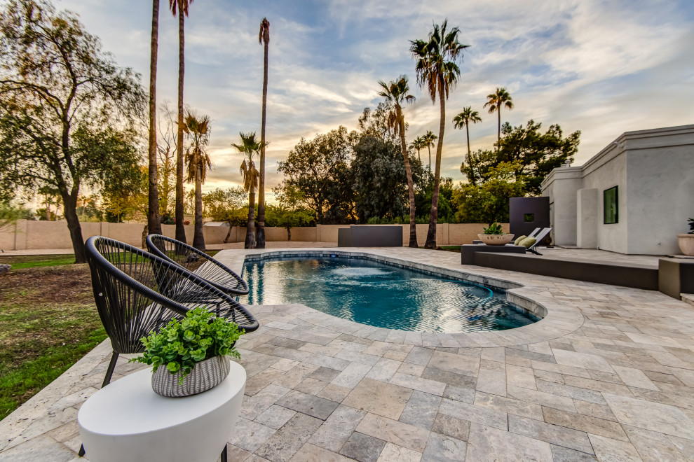 Transitional custom-shaped pool photo in Phoenix