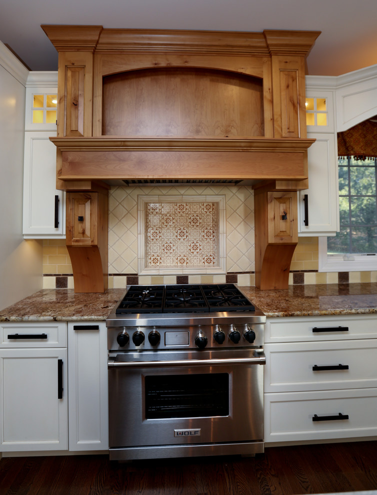 Large country kitchen in New York with medium hardwood floors.