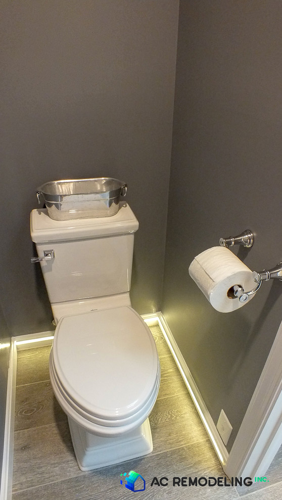 Toilet room with motion sensor LED strip lights.